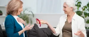 A Woman Gifting Another Woman